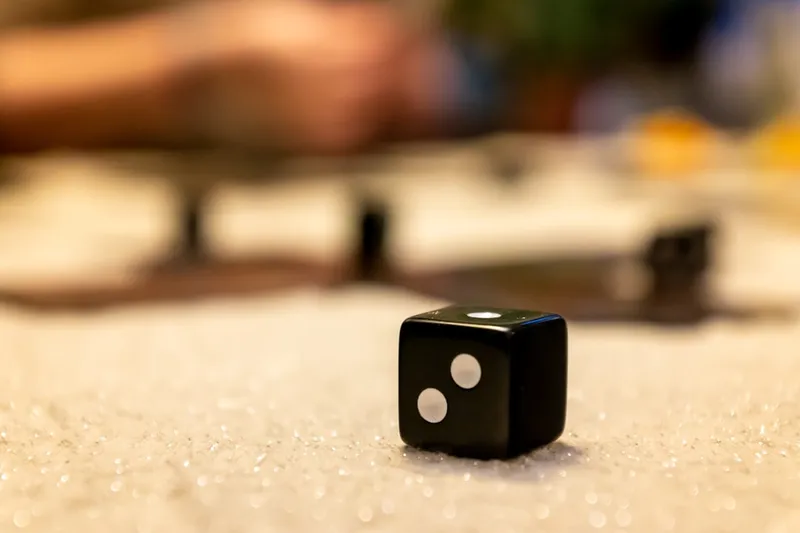 black dice on white table